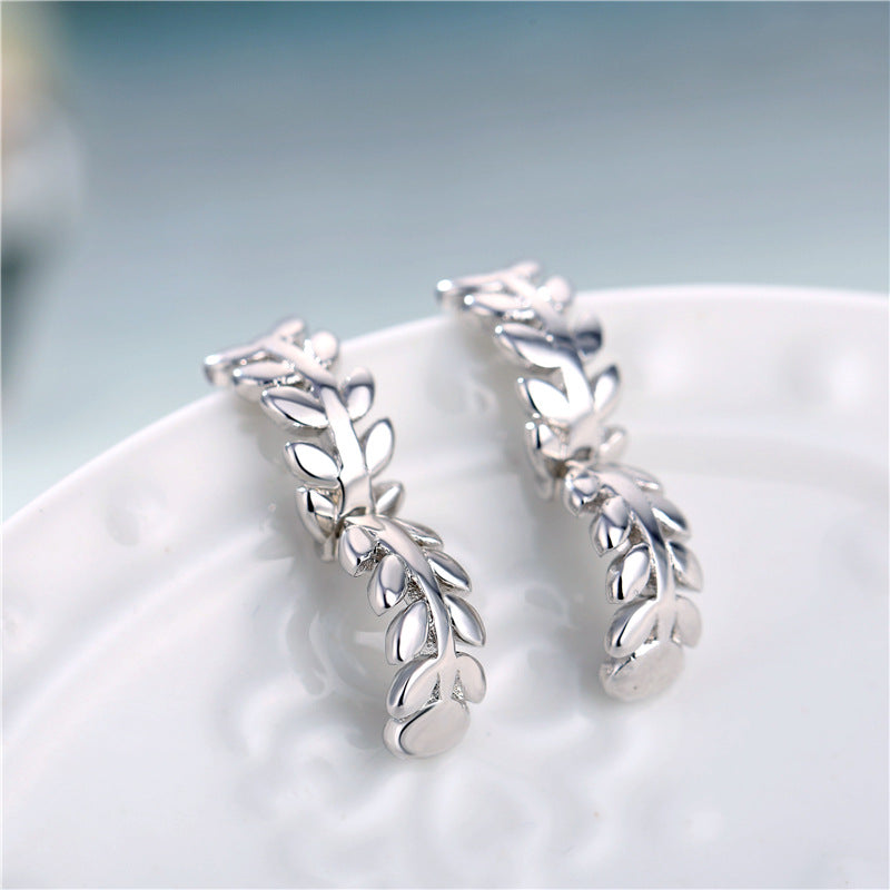 Tiny branch leaf earrings