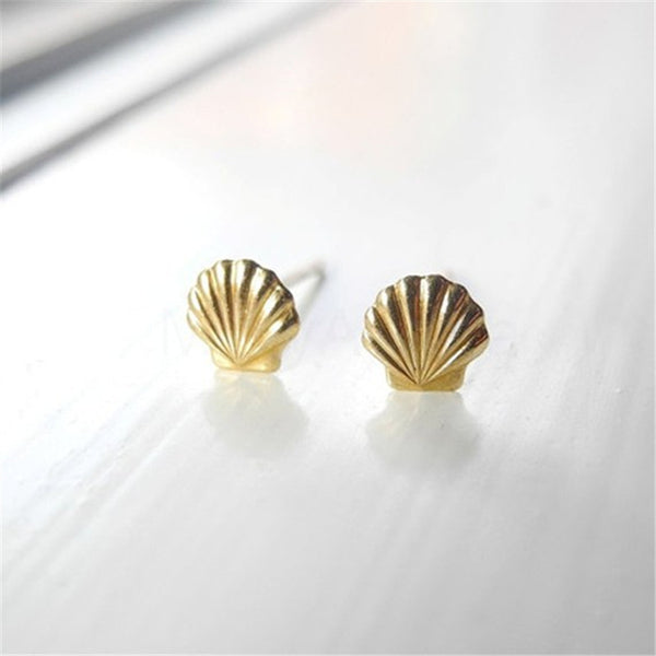 Gold seashell studs